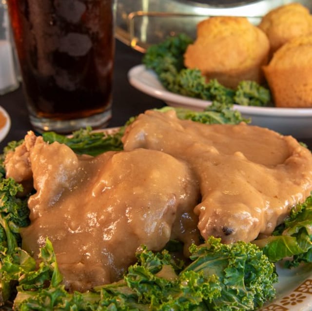 Smothered Pork Chops (2pieces).