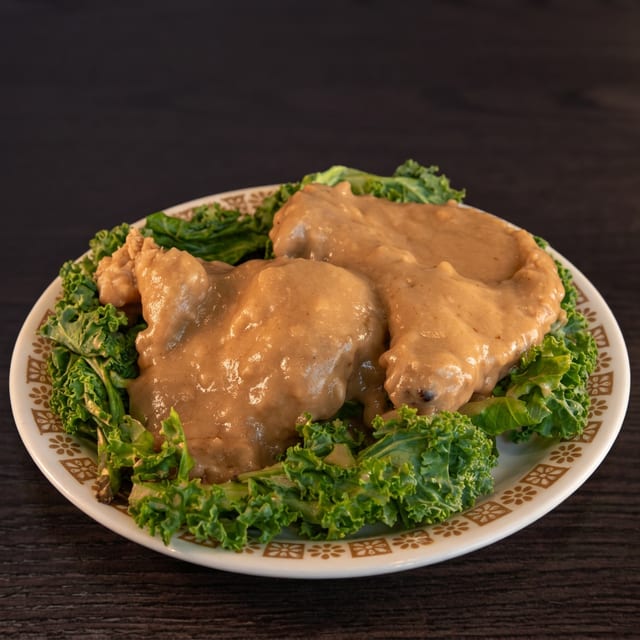Smothered Pork Chops (2 Pieces).